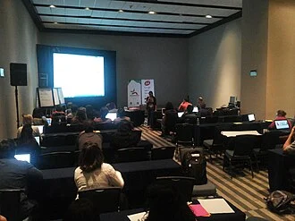 Participants at an education pre-conference